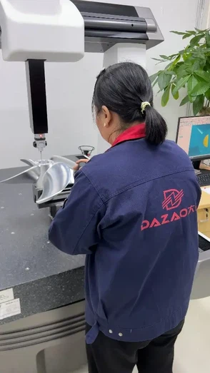 Coordinate Measuring Machine (CMM) inspecting tight custom CNC tolerances on an aluminum component at Dazao factory Coordinate Measuring Machine (CMM) inspecting tight custom CNC tolerances on an aluminum component at Dazao factory